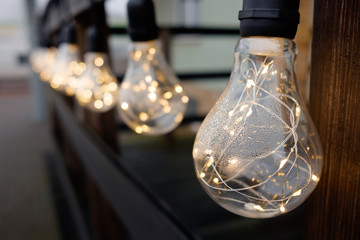 christmas street bulb lights outdoors, close up