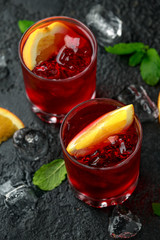 Classic Old Fashioned Negroni cocktail on rustic stone background