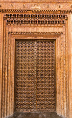 wooden door of an historical palace in churu, Rajasthan