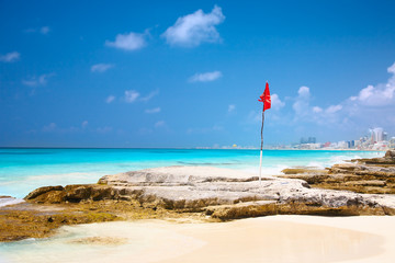 red flag on the beach