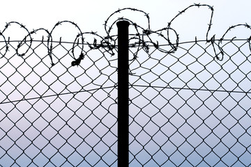 fence with barbed wire