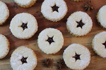 Close-up of traditional linzer cookies on the wooden background