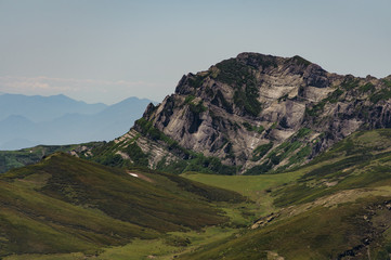 View at the mountain among green hills