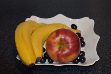 fresh fruits on a plate