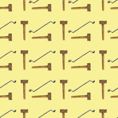 Seamless light yellow background of wrench and hammer