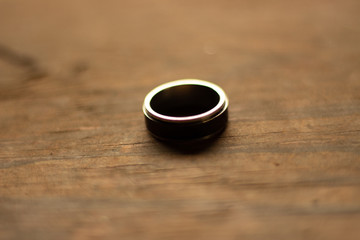 silver and black steel ring