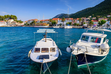 Colorful fishing boats in the Harbor of Trpanj town, Peljesac Peninsula, Dalmatia region, Croatia. The picturesque coast of the Adriatic sea in Trpanj town