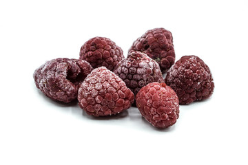 frozen raspberries isolated on white background