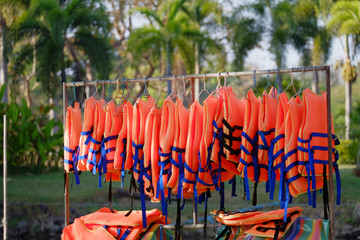 Life jackets hanging on clotheslines