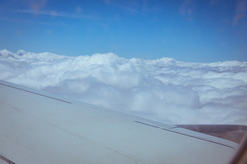 Fototapeta na wymiar Views of a sea of clouds from an airplane