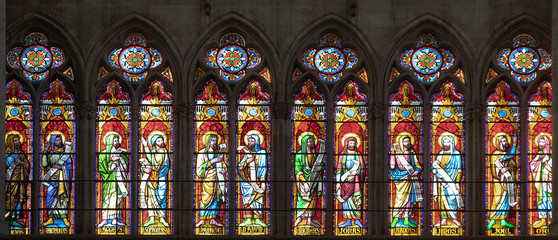 Detail of a stained glass window of a church in the city of Troyes in France