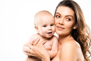 portrait of naked mother holding happy baby boy, isolated on white