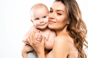 portrait of cheerful naked mother holding baby, isolated on white