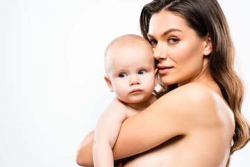 portrait of attractive naked mother hugging baby, isolated on white