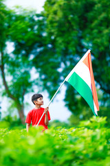 Cute little boy with Indian National Tricolor Flag	