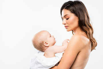 portrait of attractive naked mother holding baby, isolated on white