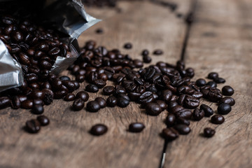 Arabica roast coffee bean spread on wood table