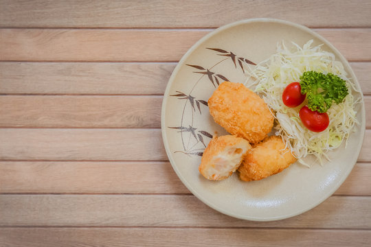 Ebi cream koroke - japanese style deep fried CREAMY SHRIMP CROQUETTES on wooden background , stock photo