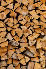 Stack or pile of chopped firewood logs, wood for winter