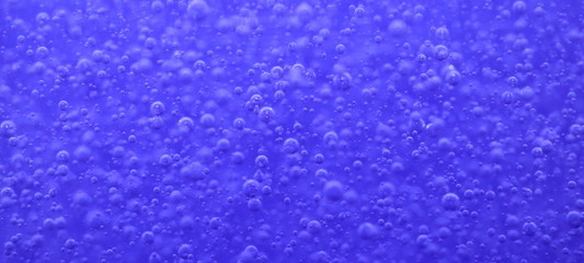 Bubbles in a blue bottle