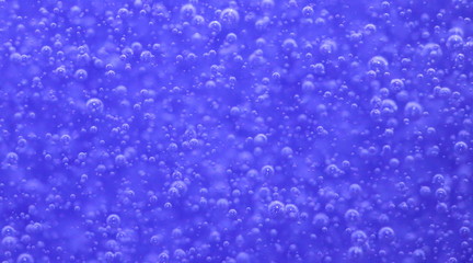 Bubbles in a blue bottle