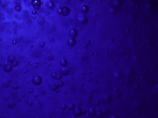 Bubbles in a blue bottle