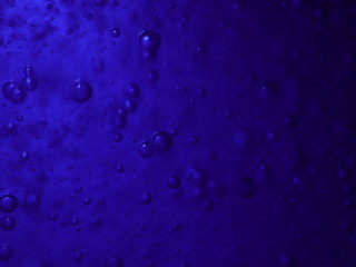 Bubbles in a blue bottle
