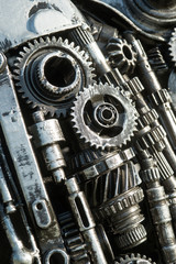Old metal gears and mechanical component background.