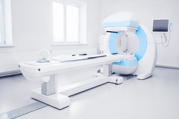 Modern medical equipment in laboratory. CT scan in hospital room.