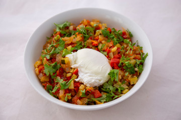 Spanish dish pisto manchego with poached egg