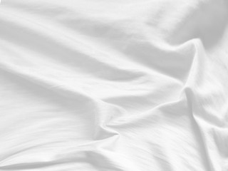 Obraz premium Crumpled white fabric background. White cloth background abstract.
