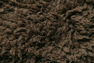 Dark chocolate brown fur furry rug with lots of texture