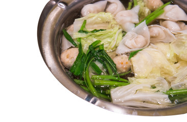 Close up of hot pot in Thai style Sukiyaki. Picture is isolated on white background. Clipping path is included.