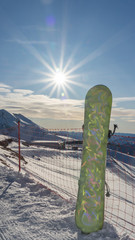 Rosa Khutor ski resort. Mountain landscape of Krasnaya Polyana and sun shining, Sochi, Russia.