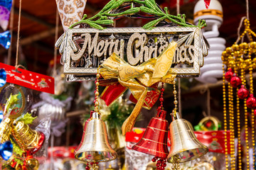 Merry Christmas written board, Christmas ball and Christmas bells for Holiday home decoration , Happy new year 2020.