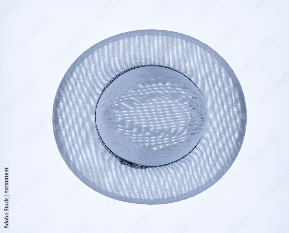 Canvas Prints blue summer straw hat isolated on white background, top view