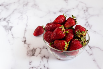 Fresh strawberries on the kitchen table