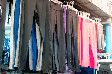 Warm pants were hung on the clothesline for sale in the clothing market