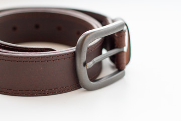 Mens brown leather belt on a white background