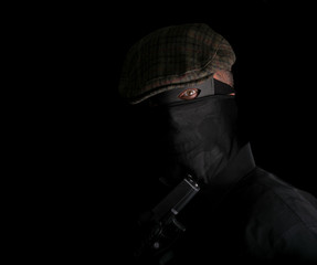 masked intruder shows you his gun