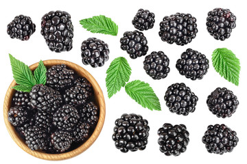 blackberry with leaf in wooden bowl isolated on a white background closeup