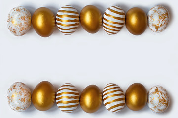 Frame from easter eggs on white background with copy space. Easter background. Top view
