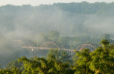 Fototapeta na wymiar Misty Cotter Bridge