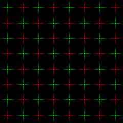 Bright green and red stars on a black background.