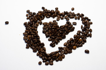 heart made of coffee beans isolated on white background