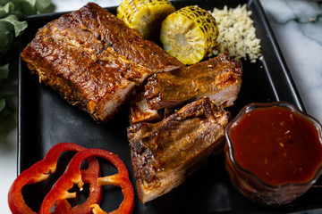 grilled steak with sauce and vegetables