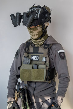 Navy SEAL United States soldier or private military contractor with Load out. Image on a grey background.