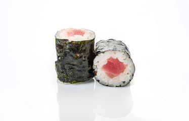 traditional fresh japanese sushi rolls on a white background