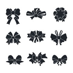 Black bows and ribbons. Gift ties silhouettes isolated on white, birthday gift and New Year present bows. Vector illustration decorative elegant simple elements shapes holiday bow