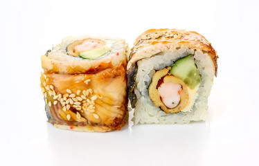 traditional fresh japanese sushi rolls on a white background